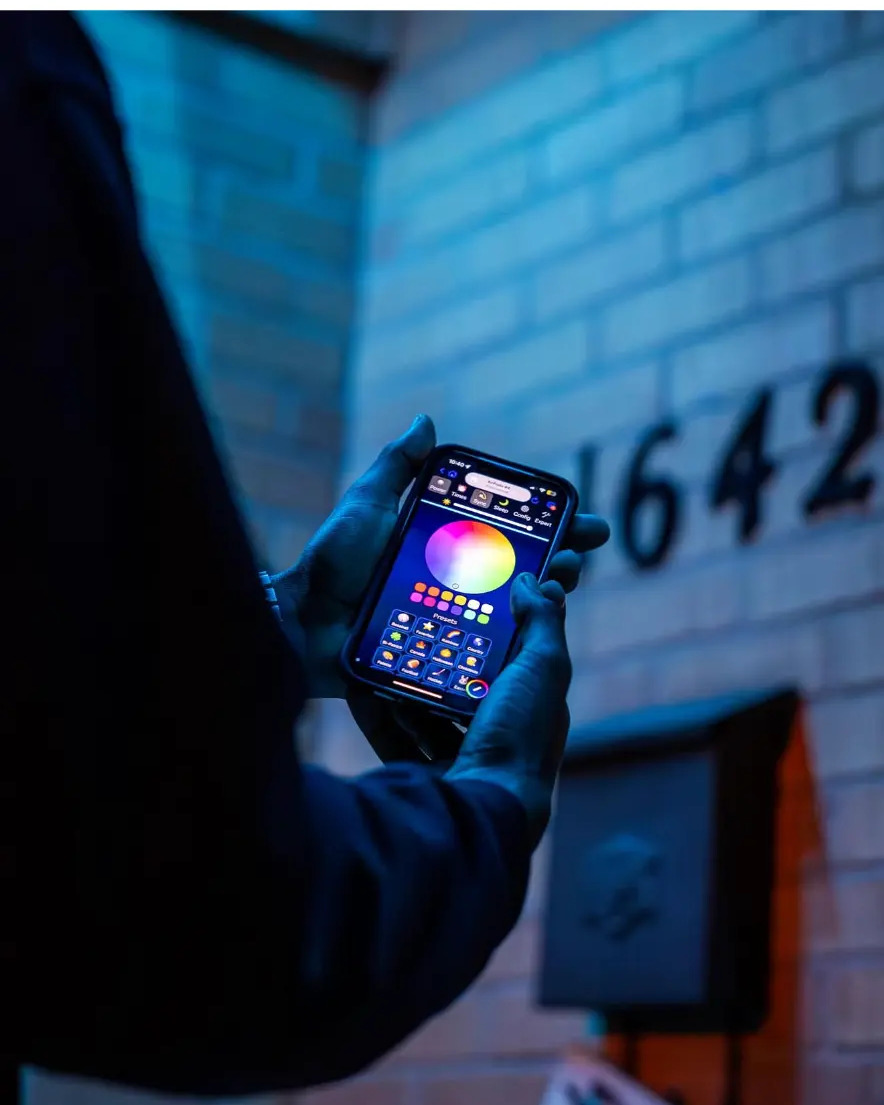 Choosing a colour scene for the roofline lights in the control app at night